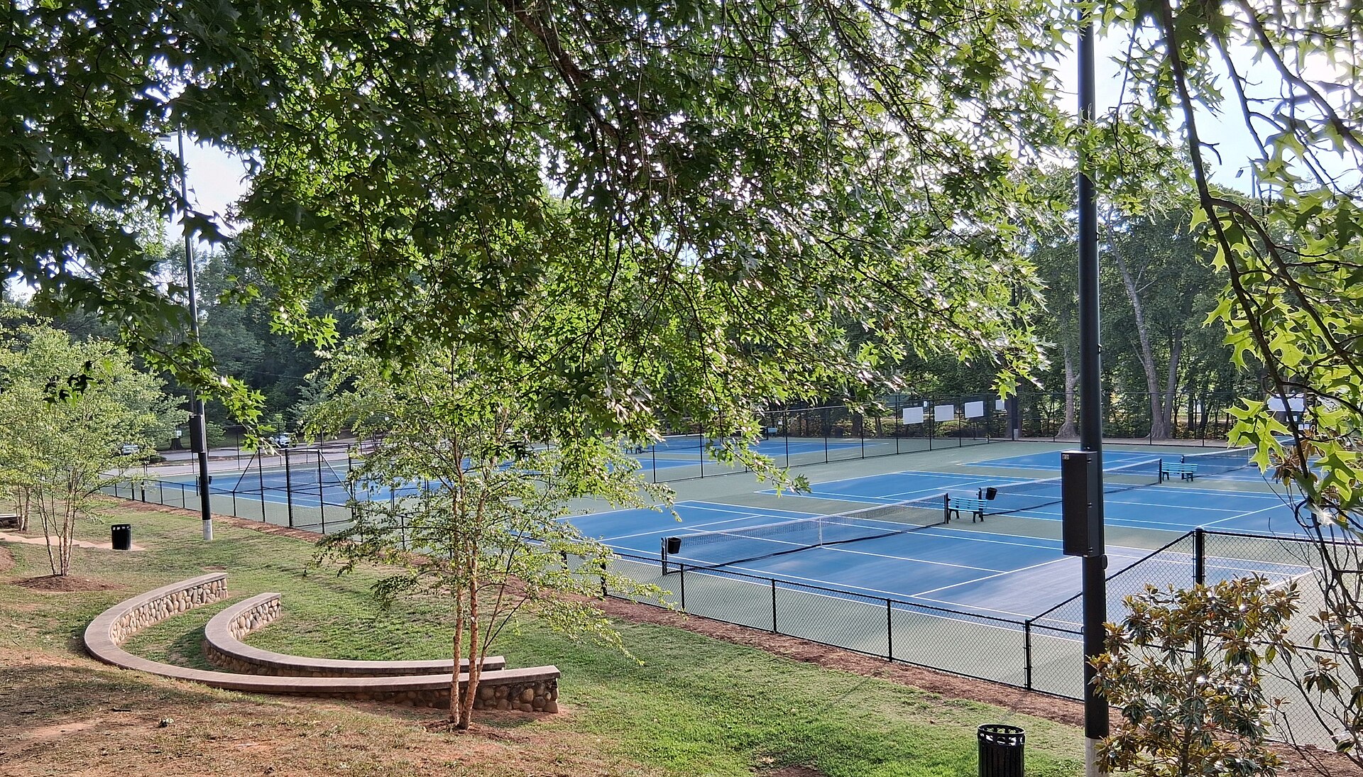 Floodlit hard court, evening